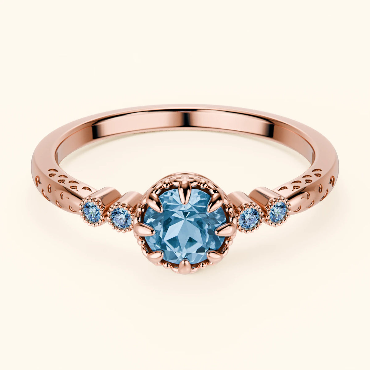 Pierścionek zaręczynowy Clarté – Topaz Swiss Blue 0,50 ct, kamienie boczne: niebieski diament laboratoryjny