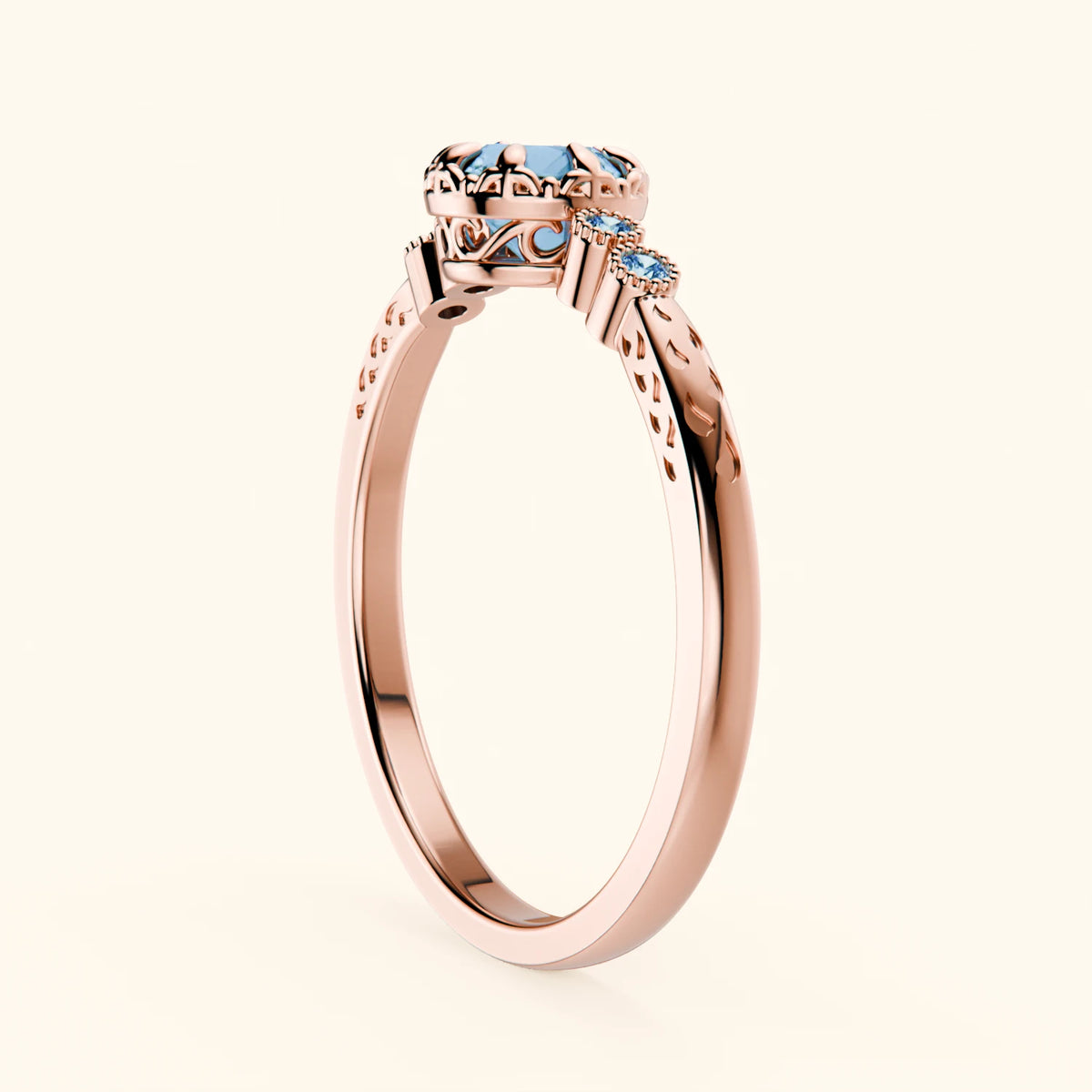 Pierścionek zaręczynowy Clarté – Topaz Swiss Blue 0,50 ct, kamienie boczne: niebieski diament laboratoryjny