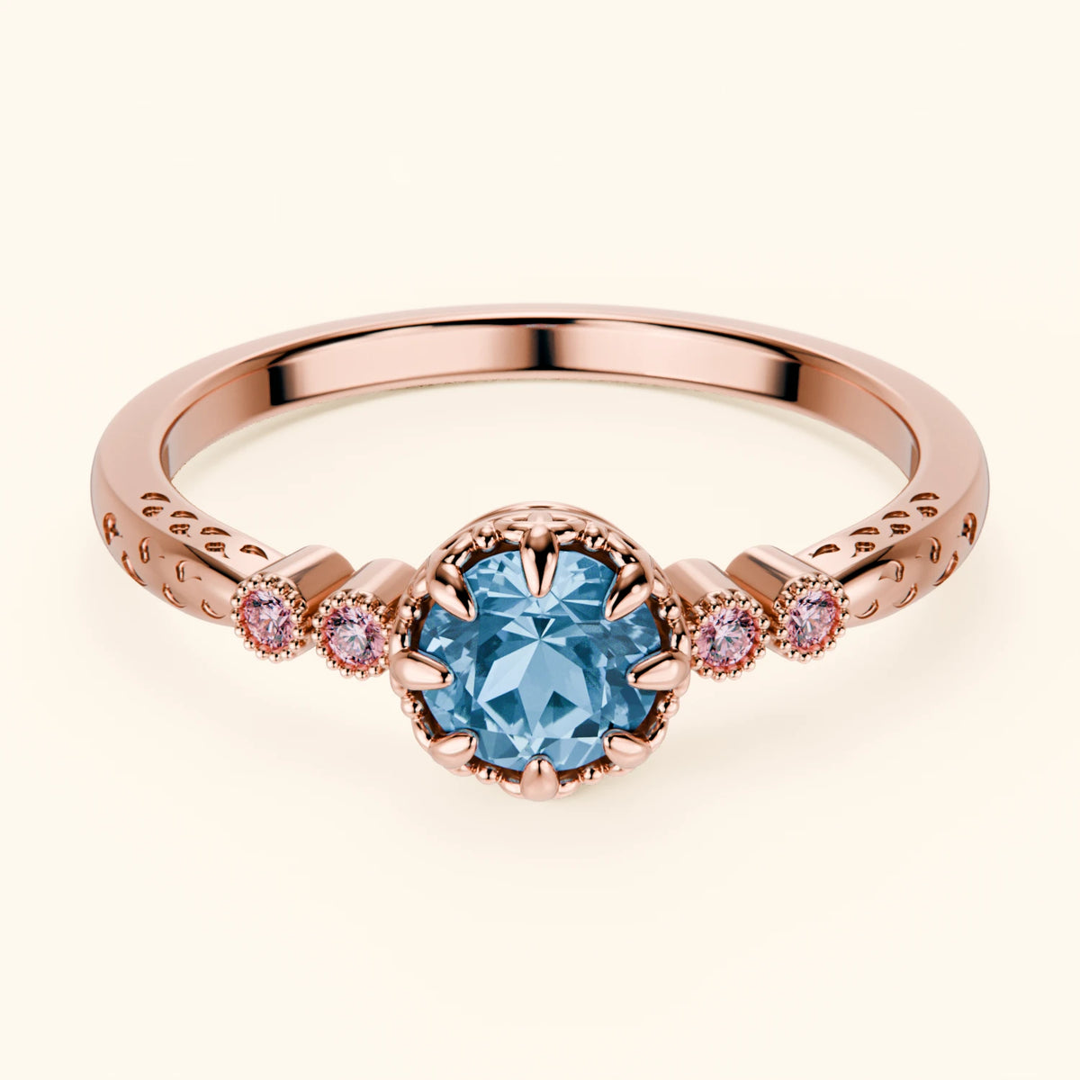 Pierścionek zaręczynowy Clarté – Topaz Swiss Blue 0,50 ct, kamienie boczne: różowy diament laboratoryjny