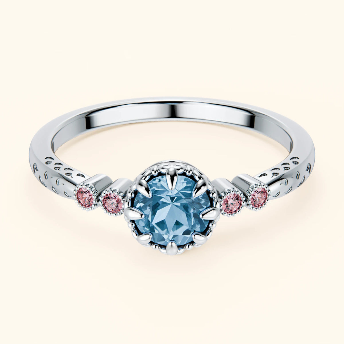 Pierścionek zaręczynowy Clarté – Topaz Swiss Blue 0,50 ct, kamienie boczne: różowy diament laboratoryjny