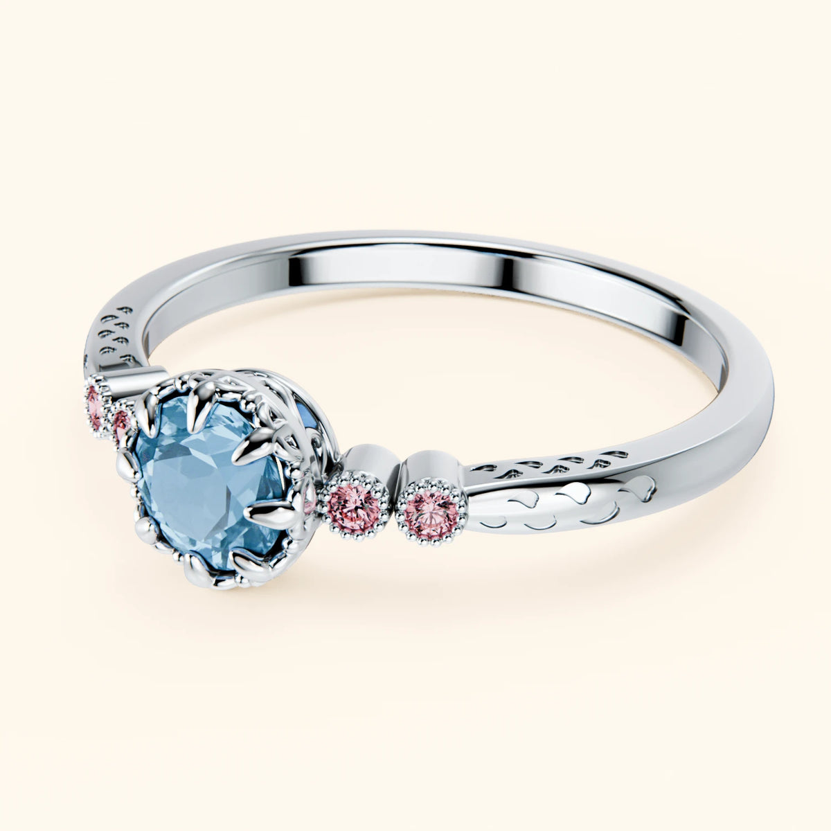 Pierścionek zaręczynowy Clarté – Topaz Swiss Blue 0,50 ct, kamienie boczne: różowy diament laboratoryjny