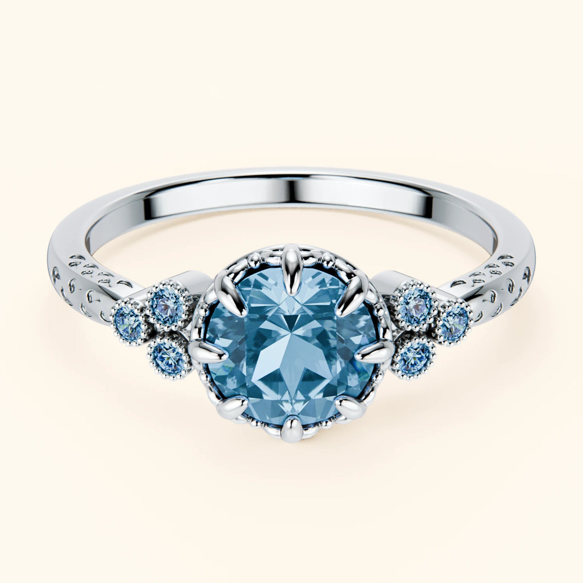 Pierścionek zaręczynowy Clarté – Topaz Swiss Blue 0,85 ct, kamienie boczne: niebieski diament laboratoryjny