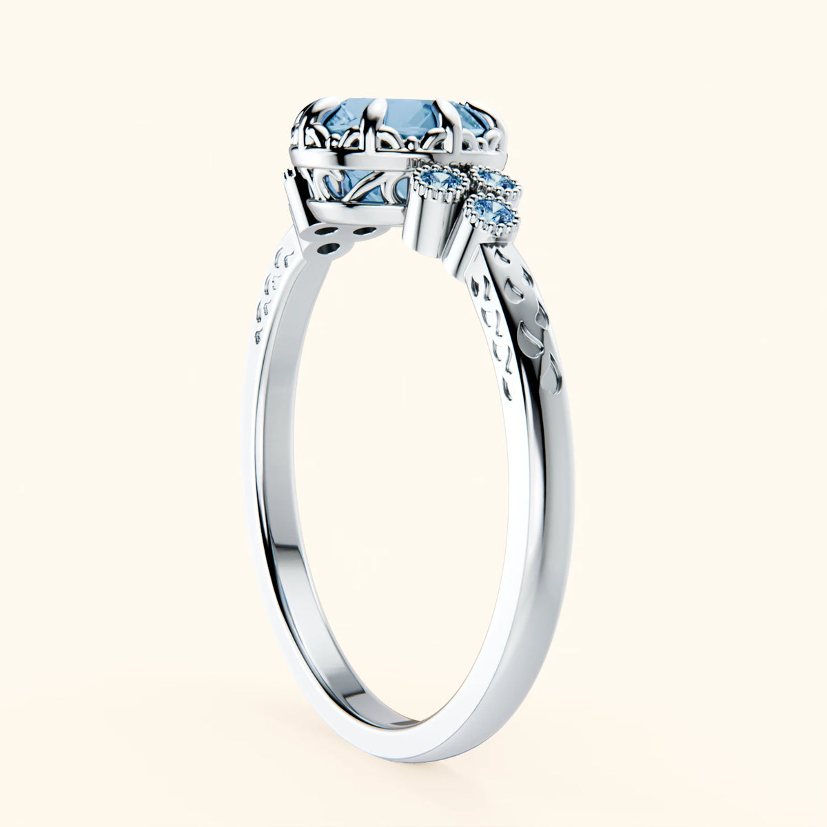 Pierścionek zaręczynowy Clarté – Topaz Swiss Blue 0,85 ct, kamienie boczne: niebieski diament laboratoryjny
