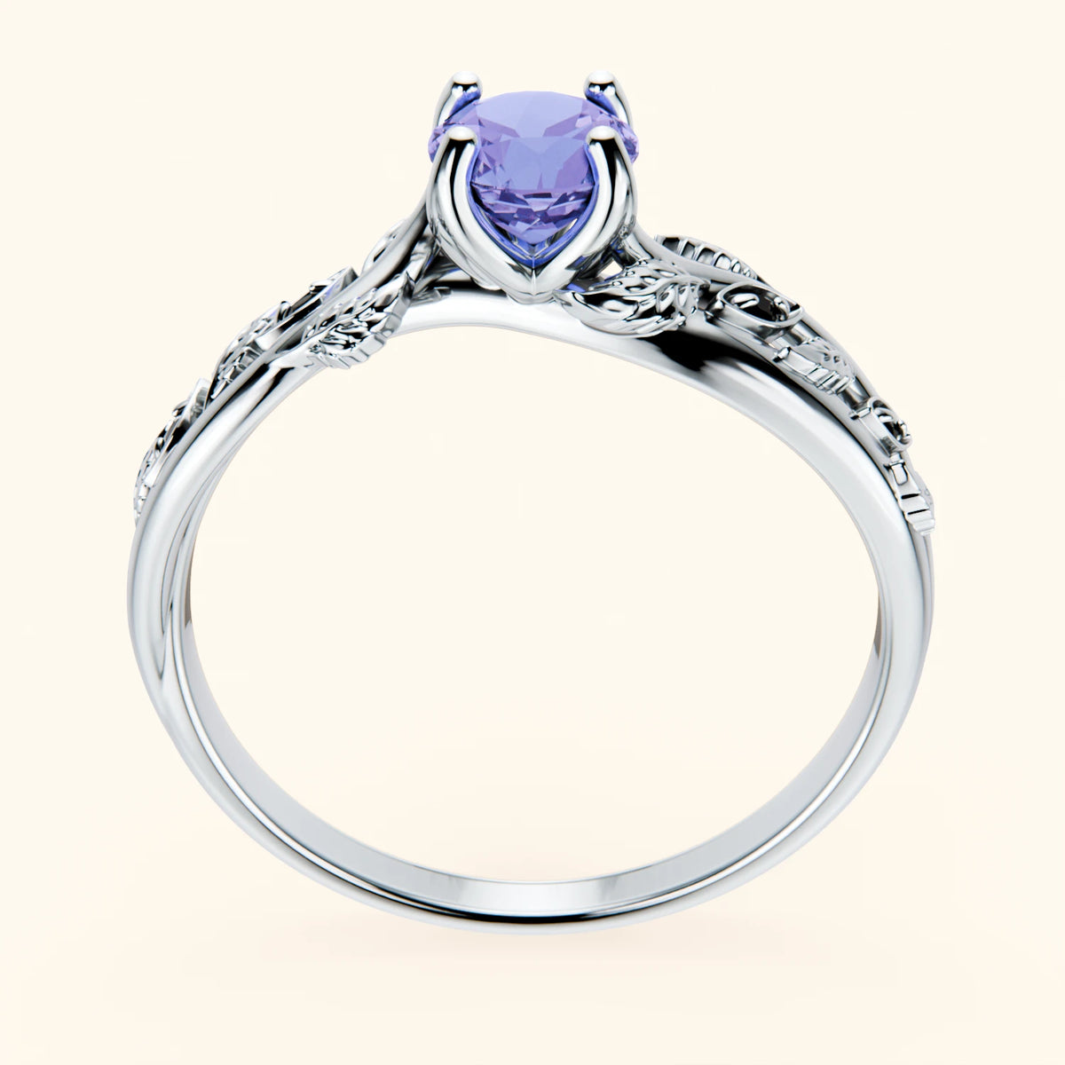 Pierścionek zaręczynowy Frêne – Tanzanit 0,45 ct, kamienie boczne: czarny diament