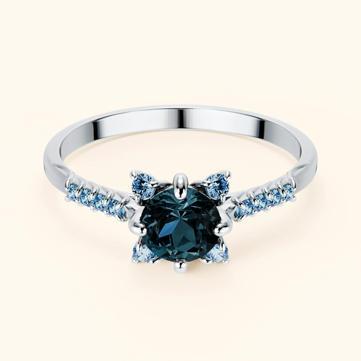 Pierścionek zaręczynowy Scintille – Topaz London Blue 0,50 ct, kamienie boczne: niebieski diament laboratoryjny