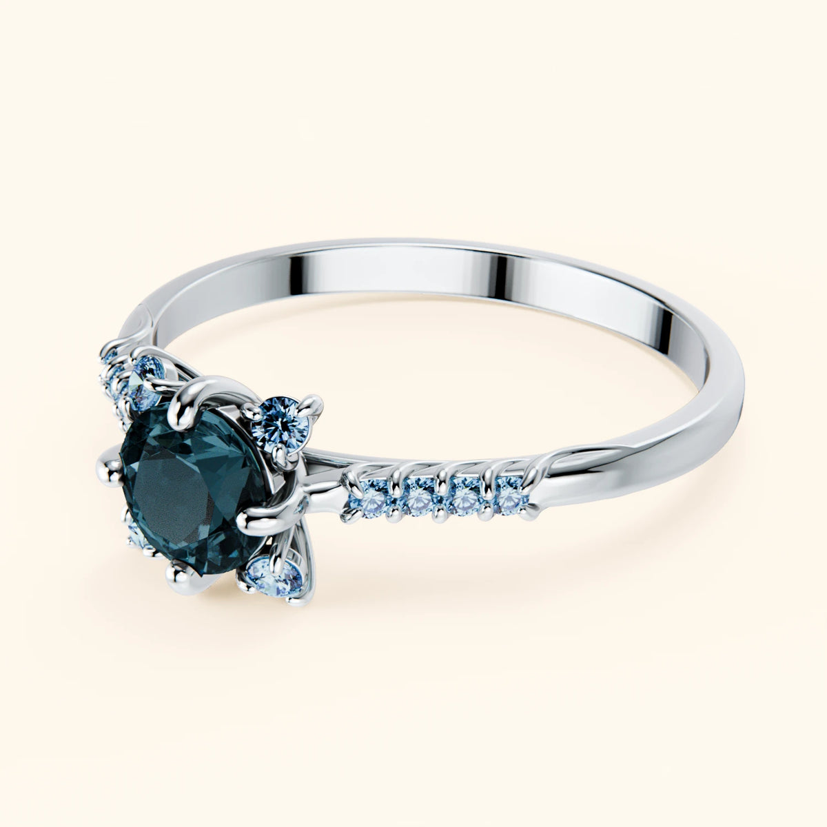 Pierścionek zaręczynowy Scintille – Topaz London Blue 0,50 ct, kamienie boczne: niebieski diament laboratoryjny
