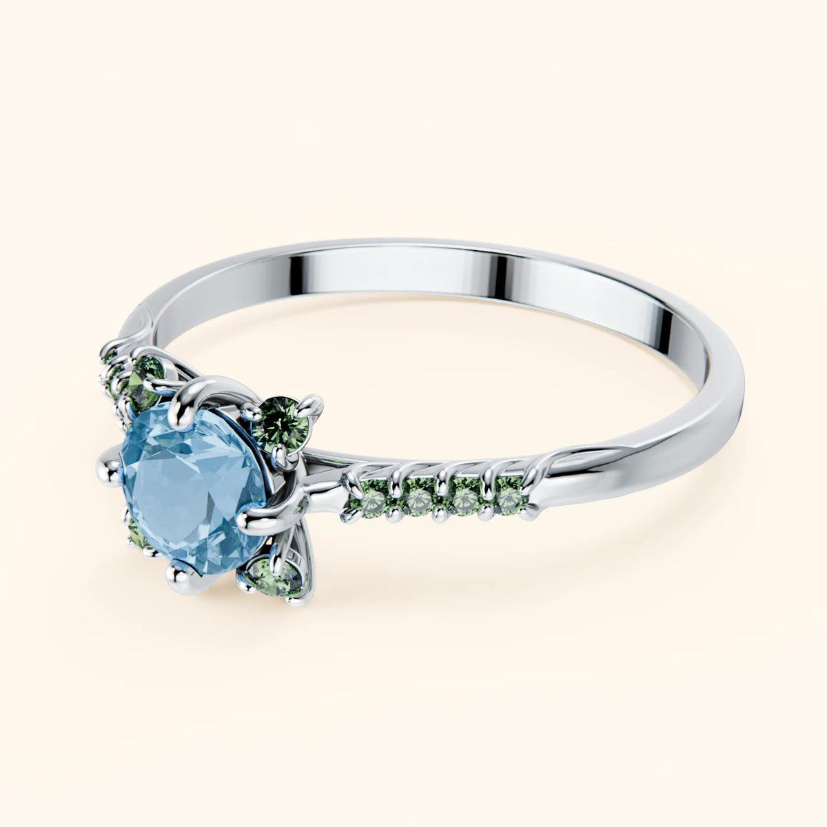 Pierścionek zaręczynowy Scintille – Topaz Swiss Blue 0,50 ct, kamienie boczne: zielony diament laboratoryjny