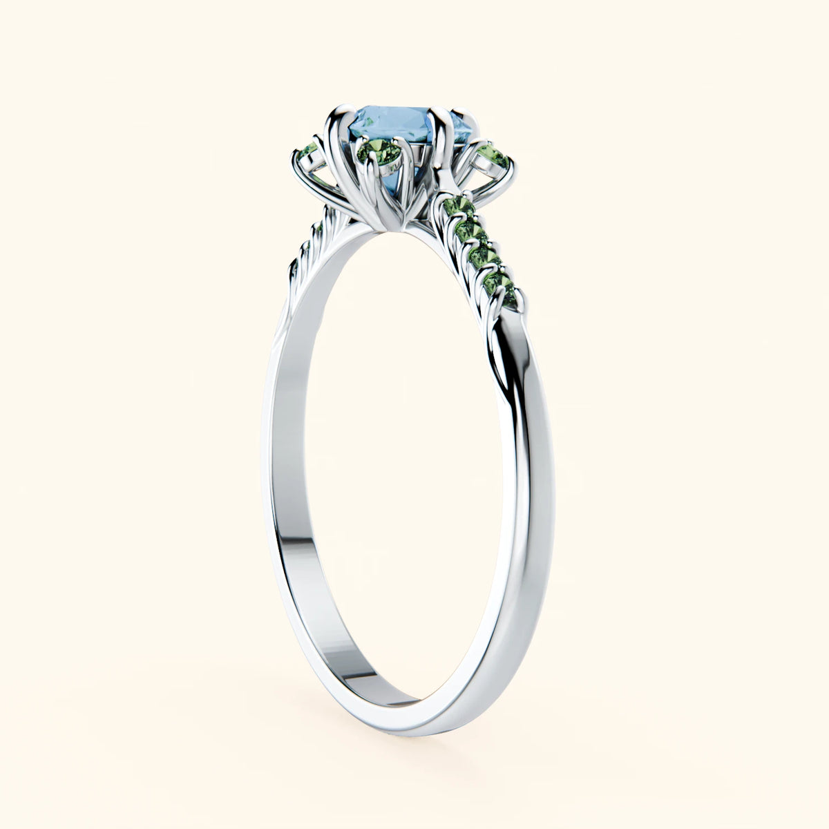 Pierścionek zaręczynowy Scintille – Topaz Swiss Blue 0,50 ct, kamienie boczne: zielony diament laboratoryjny