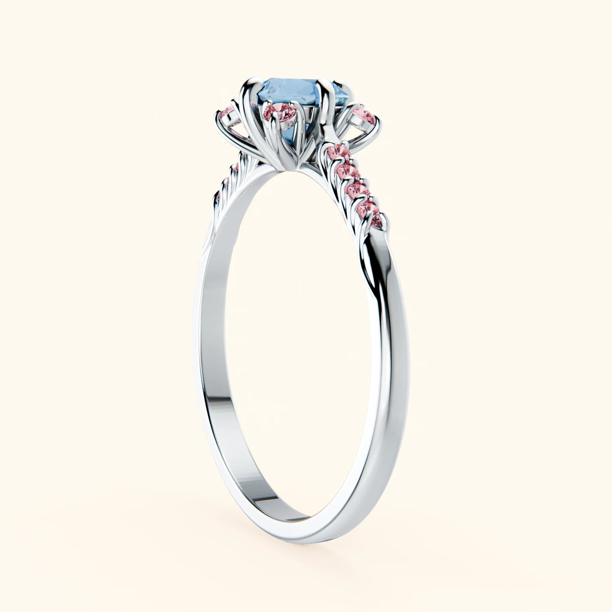 Pierścionek zaręczynowy Scintille – Topaz Swiss Blue 0,50 ct, kamienie boczne: różowy diament laboratoryjny