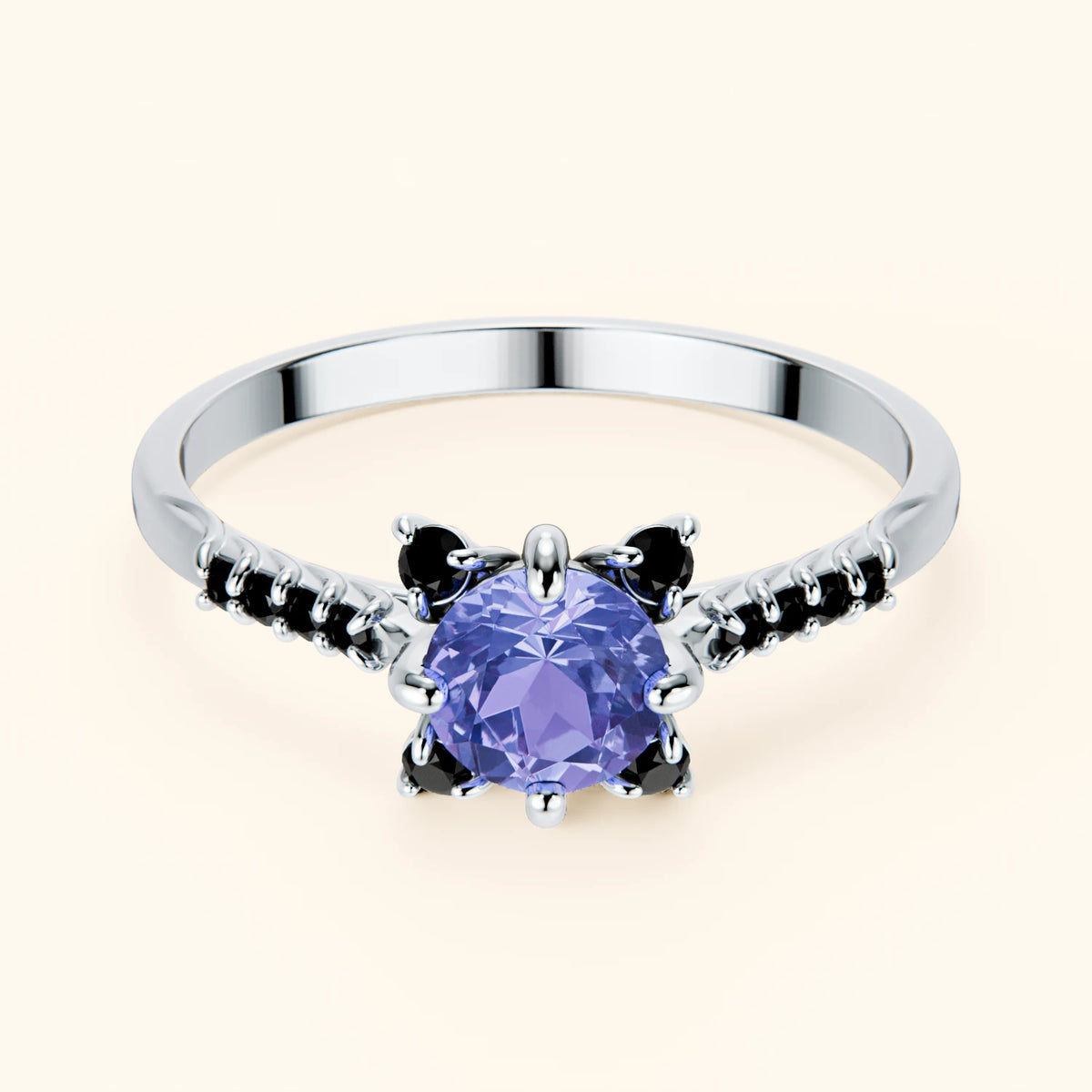 Pierścionek zaręczynowy Scintille – Tanzanit 0,45 ct, kamienie boczne: czarny diament