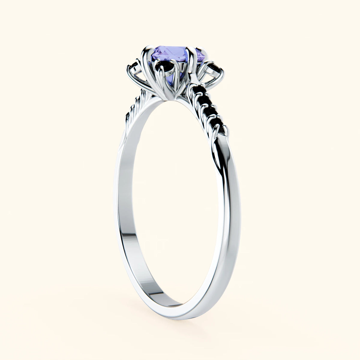 Pierścionek zaręczynowy Scintille – Tanzanit 0,45 ct, kamienie boczne: czarny diament